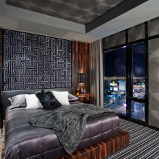 Luxe Gray Art Deco Bedroom With Metallic Finishes & Striped Carpet