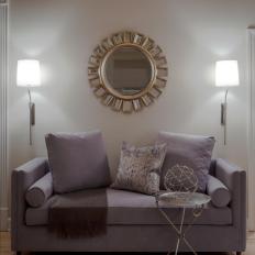 Neutral Living Room with Art Deco Mirror and Purple Sofa