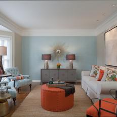 Energetic Transitional Living Room With Blue Accent Wall