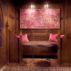 Nook with Wood Paneled Walls and Abstract Artwork 