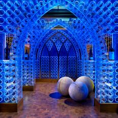 Transitional Wine Cellar with Blue LED Light Arches 