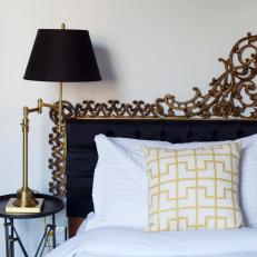 Master Bedroom Boasts Elegant Black and Gold Headboard