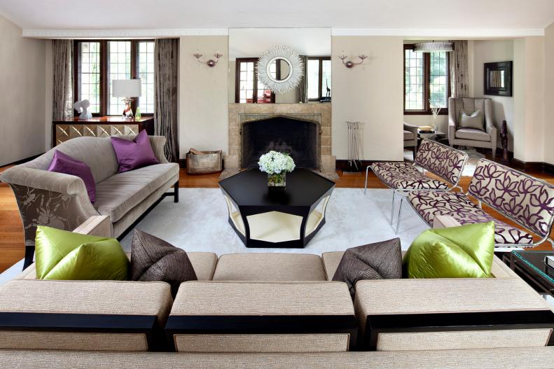 Neutral Transitional Living Space With Green and Purple Accents