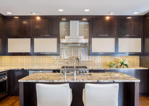 Kitchen With Granite Countertops And Glass Tile Backsplash