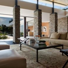 Open Neutral Living Space With Stone Columns