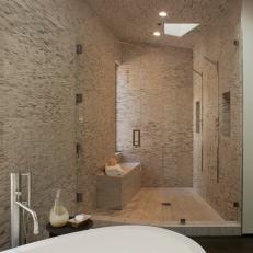 Spa-Style Master Bathroom with Stone-Tiled Walls