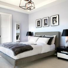 Trendy Gray Bedroom With Black and White Accessories