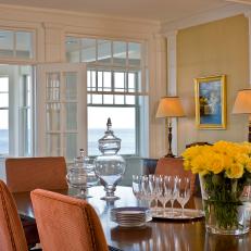 Bright Traditional Dining Room With a Coastal View