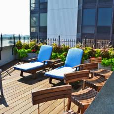 Rooftop Deck With Planters, Barstools and Lounge Chairs