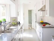 White Cottage Kitchen With Gray Countertop, Tile Backsplash