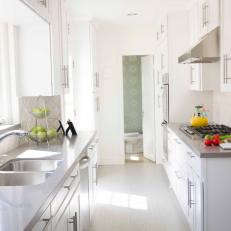 White Cottage Kitchen With Gray Countertop, Tile Backsplash