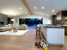 White Open Living Space With Neutral Sectional, Recessed Lighting