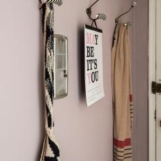 Eclectic Apartment Entry With Zebra-Style Coat Hooks