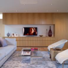 Open and Airy Modern Family Room With Oak Wood Media Wall