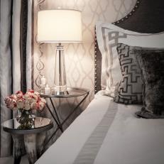 Master Bedroom with Graphic Patterns and Modern Lamp 
