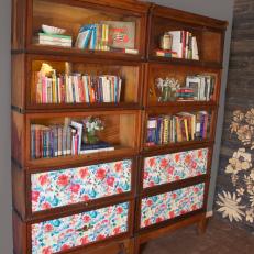 Bookshelves in Neutral Transitional Guest Room