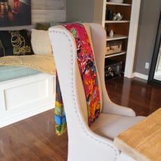 Elegant Wingback With Colorful Throw 