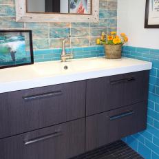 Mod Brown Floating Vanity in Teal Tiled Bathroom