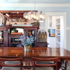 Craftsman Dining Room With Antique Table and Eclectic Art