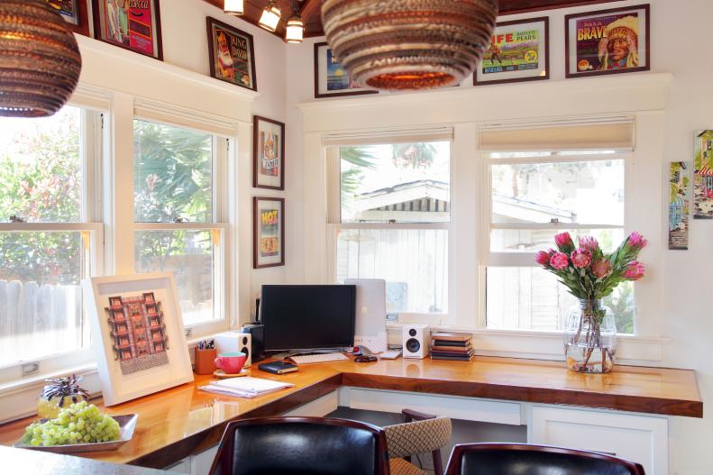 Eclectic White Home Office With Colorful Art