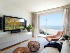 Neutral Modern Living Room With Linen Curtains and Ocean View