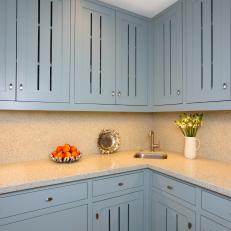 Quartz Countertops and Cool Blue Kitchen Cabinetry