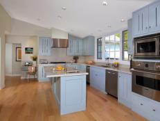Stylish Open Plan Kitchen With Light Blue Cabinetry