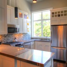 Small Neutral Contemporary Kitchen With Glass-Tile Backsplash