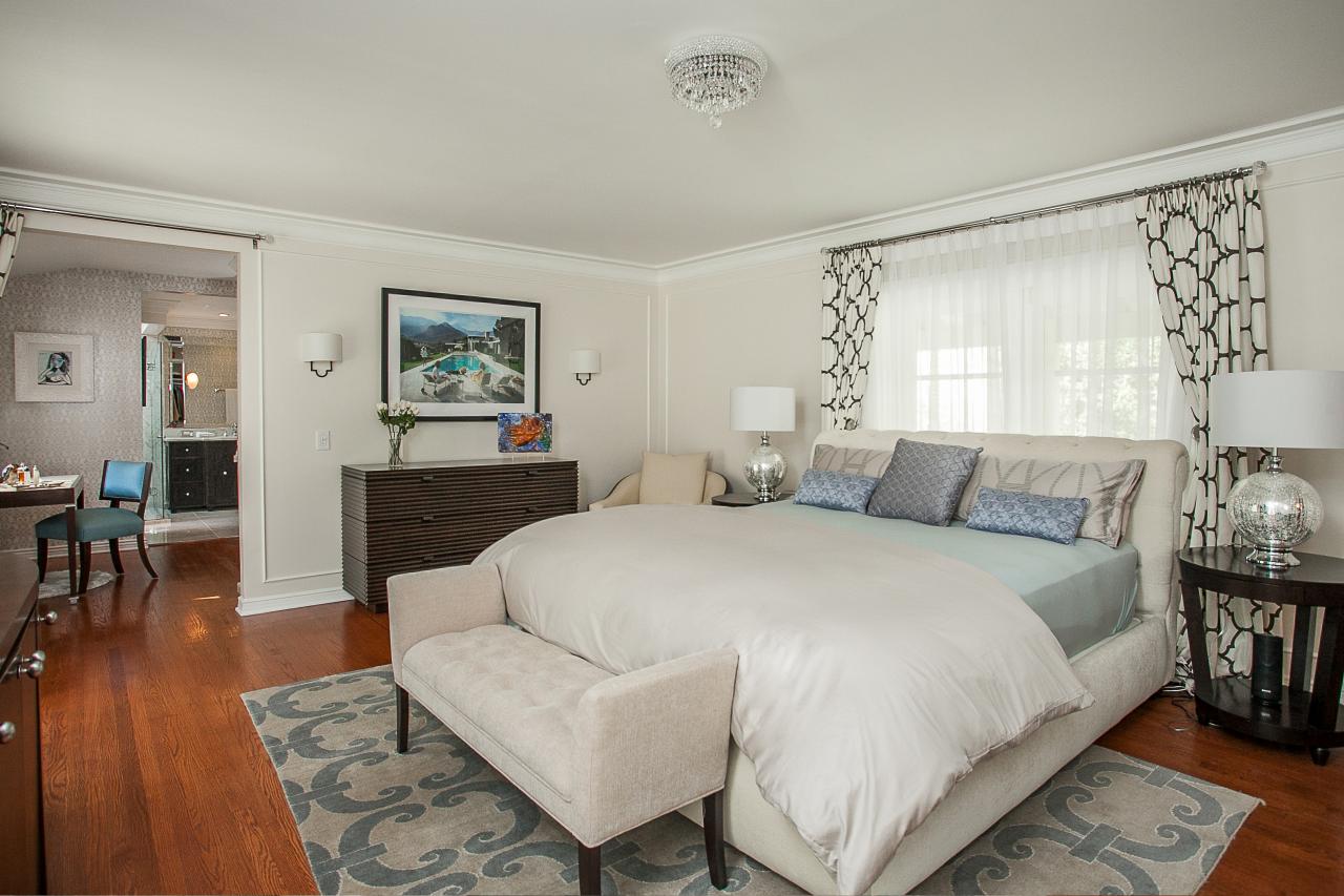 Chic Master Bedroom With Bold Patterned Curtains | HGTV