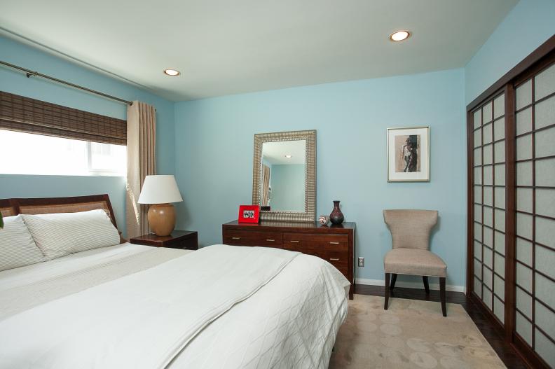 Light Blue Bedroom With Brown Asian-Style Doors