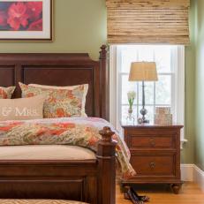 Inviting Master Bedroom With Warm Wood Furnishings