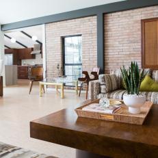 Streamlined Modern Living Space With Exposed Brick Wall