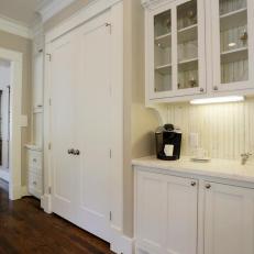 Stylish Butler Pantry With White Cabinets in Cottage Kitchen