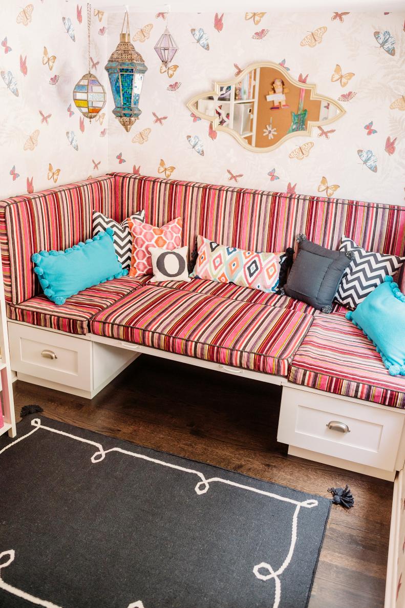 Pink- and Red-Striped Cushions on Built-In Playroom Daybed
