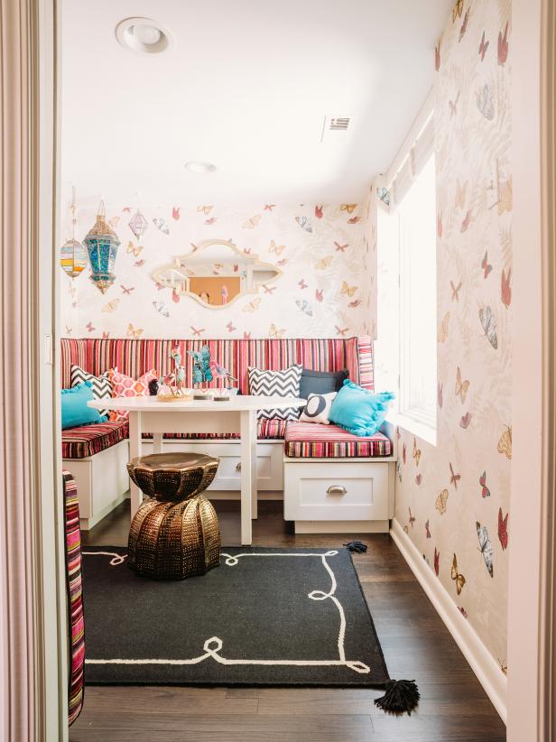 Girl's Playroom With Butterfly Wallpaper and Black & White Area Rug