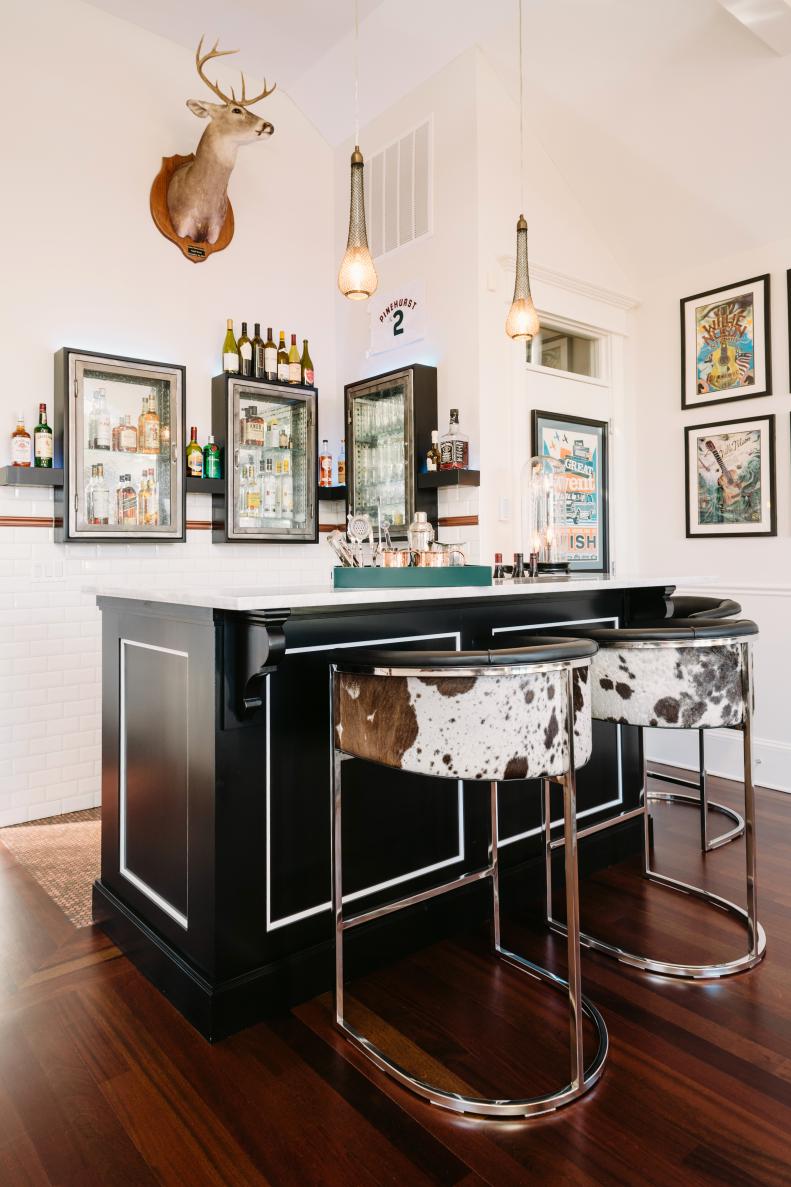 Corner Bar With Cabinets, Cow Hide Barstools & Mounted Deer Head