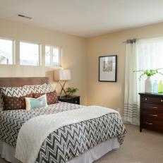 Contemporary Cream Bedroom With Brown Accents