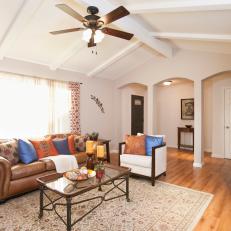 Transitional Living Room With Leather Couch & Ceiling Fan