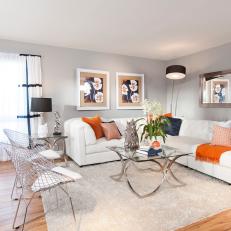 Modern White Living Room With Punches of Orange