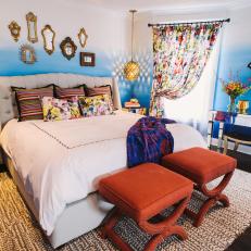 Eclectic Master Bedroom With Ombré Walls and Floral Curtains