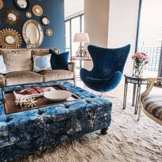 Eclectic Navy Blue Living Room with Mirror Collage