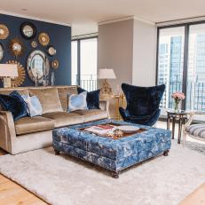Eclectic Navy Blue Living Room with Balcony Access 
