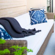 Clean-Lined Woven Wicker Sofa on Urban Terrace