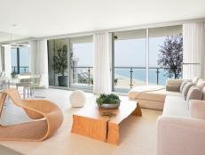 Neutral Coastal Living Space With Ocean View and Modern Furnishings