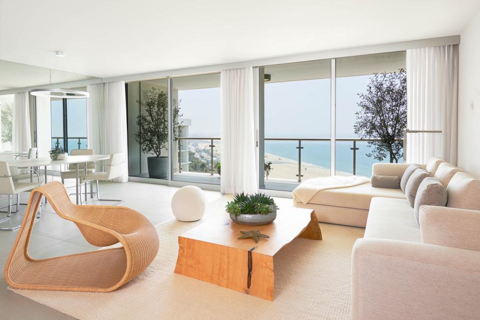 Neutral Coastal Living Space With Ocean View and Modern Furnishings