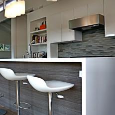 Modern Kitchen With White Cabinets, Creative Pendant Lights