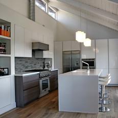 Modern White Eat-In Kitchen With Loft Plank Ceiling