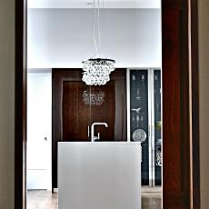 Sleek, Stylish Kitchen With Island and Modern Pendant Lights