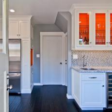 Timeless Family Kitchen With White Cabinetry, Orange Accents
