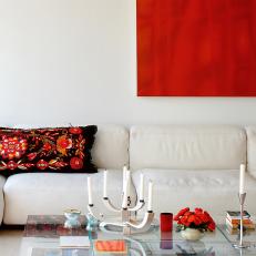 Modern Living Room With Bright Red Wall Art